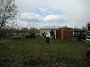 Bob shooting the bad guy with Simunitions.